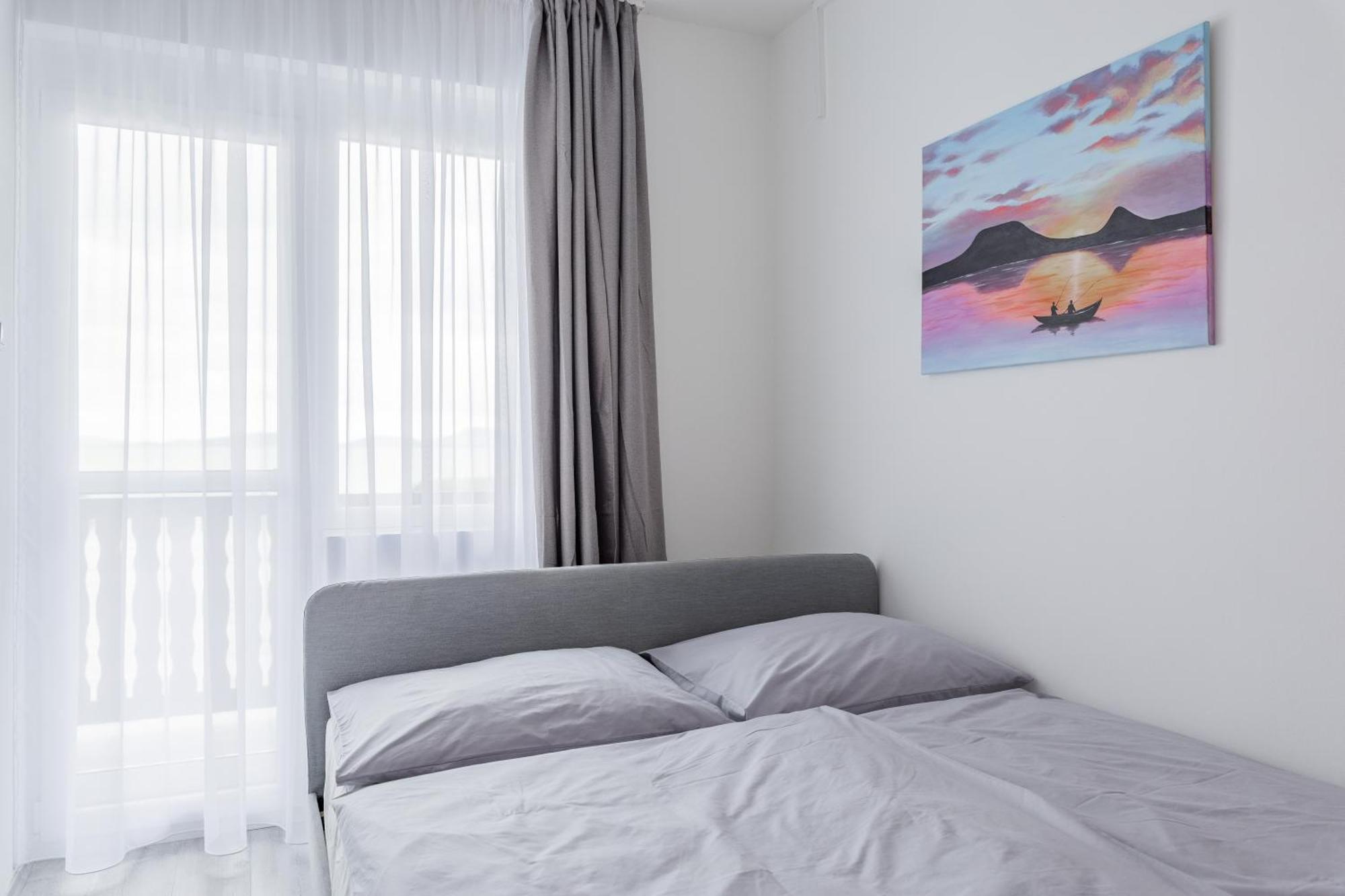Balaton a kertben - Közvetlen vízparti apartmanok, csodálatos panorámával Balatonfenyves Quarto foto