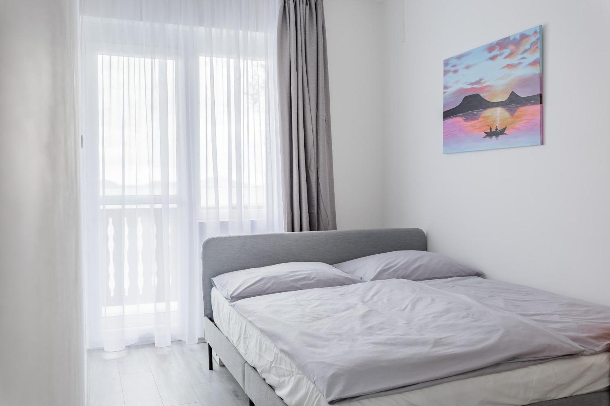 Balaton a kertben - Közvetlen vízparti apartmanok, csodálatos panorámával Balatonfenyves Quarto foto
